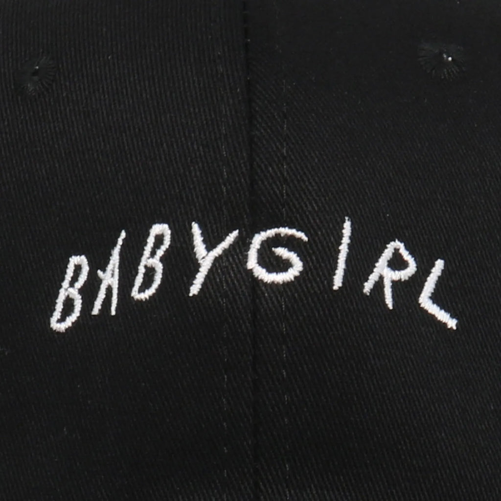 Cotton twill baseball cap with BABYGIRL letter embroidery and stripe pattern in black or white.