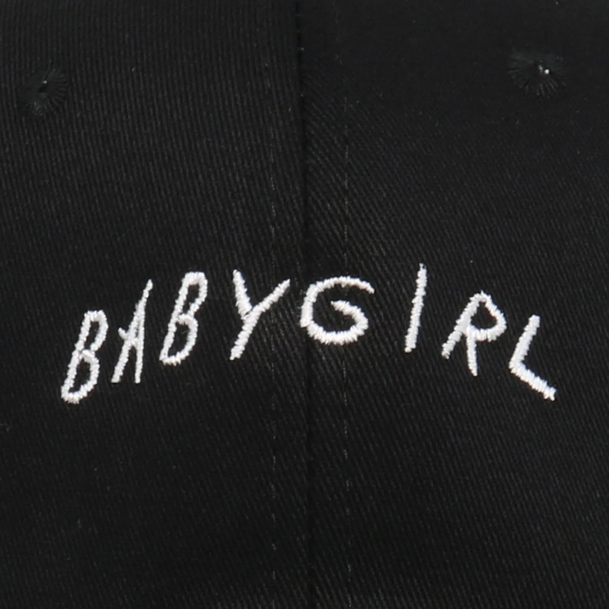 Cotton twill baseball cap with BABYGIRL letter embroidery and stripe pattern in black or white.