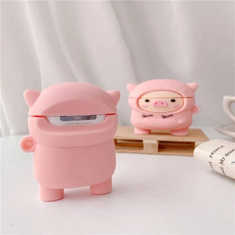 Pink silicone AirPods case cover with cartoon pig design and attachment hook