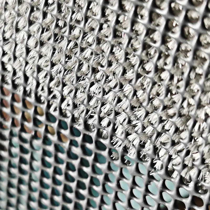 Blue detachable cleaning brush and crevice tool for washing window screens and glass.