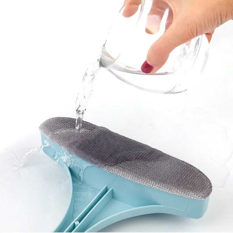 Blue detachable cleaning brush and crevice tool for washing window screens and glass.