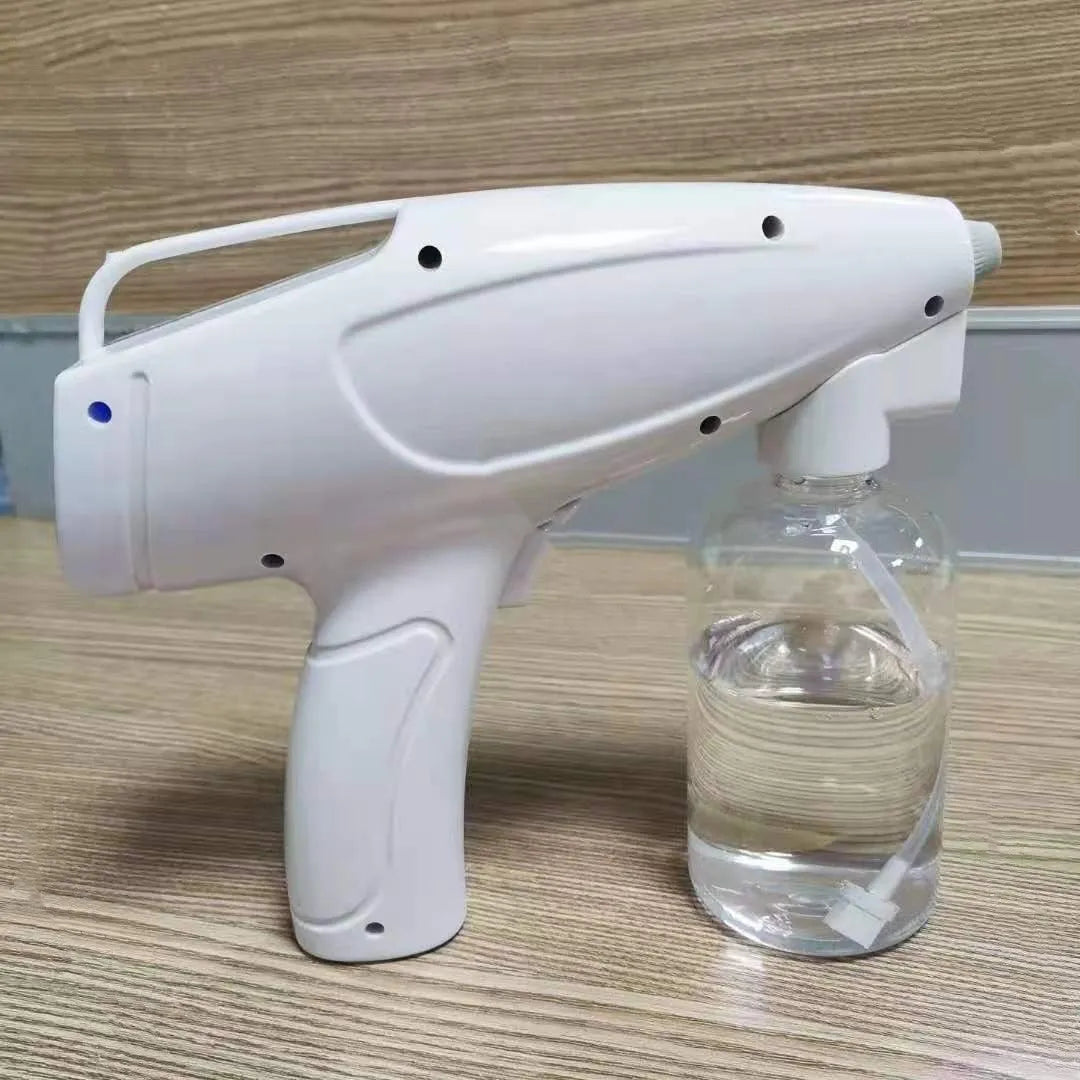 White handheld cordless electric spray disinfection gun with USB-C charging port