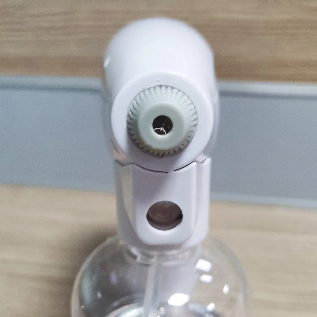 White handheld cordless electric spray disinfection gun with USB-C charging port