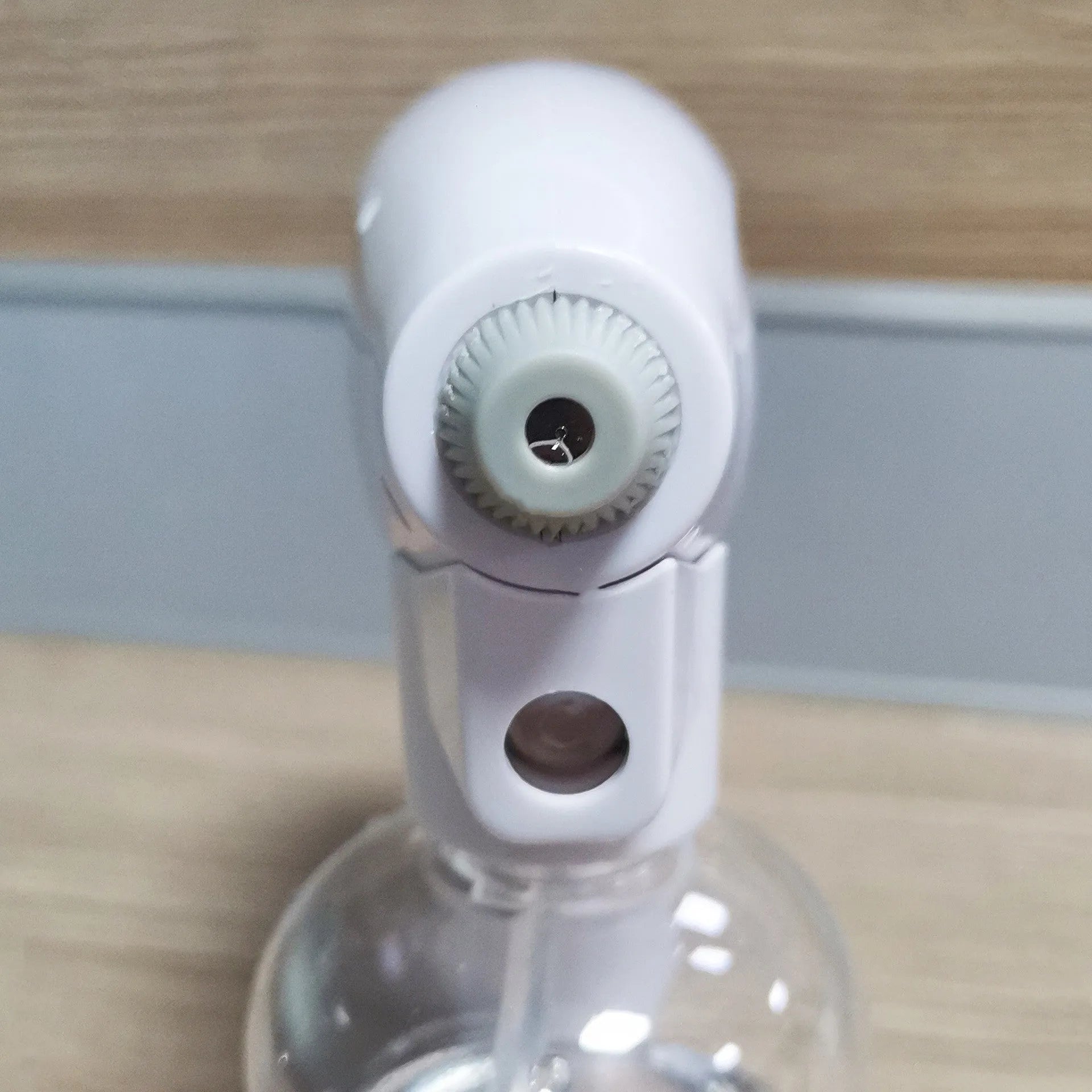 White handheld cordless electric spray disinfection gun with USB-C charging port