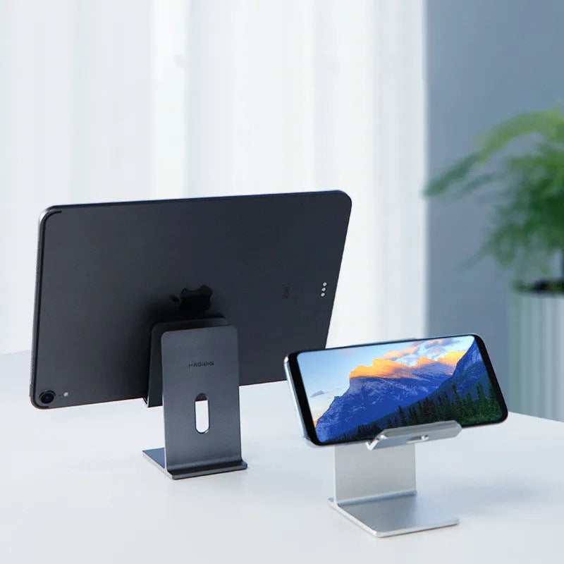 Dark grey alloy lazy bracket desktop stand holding a mobile phone