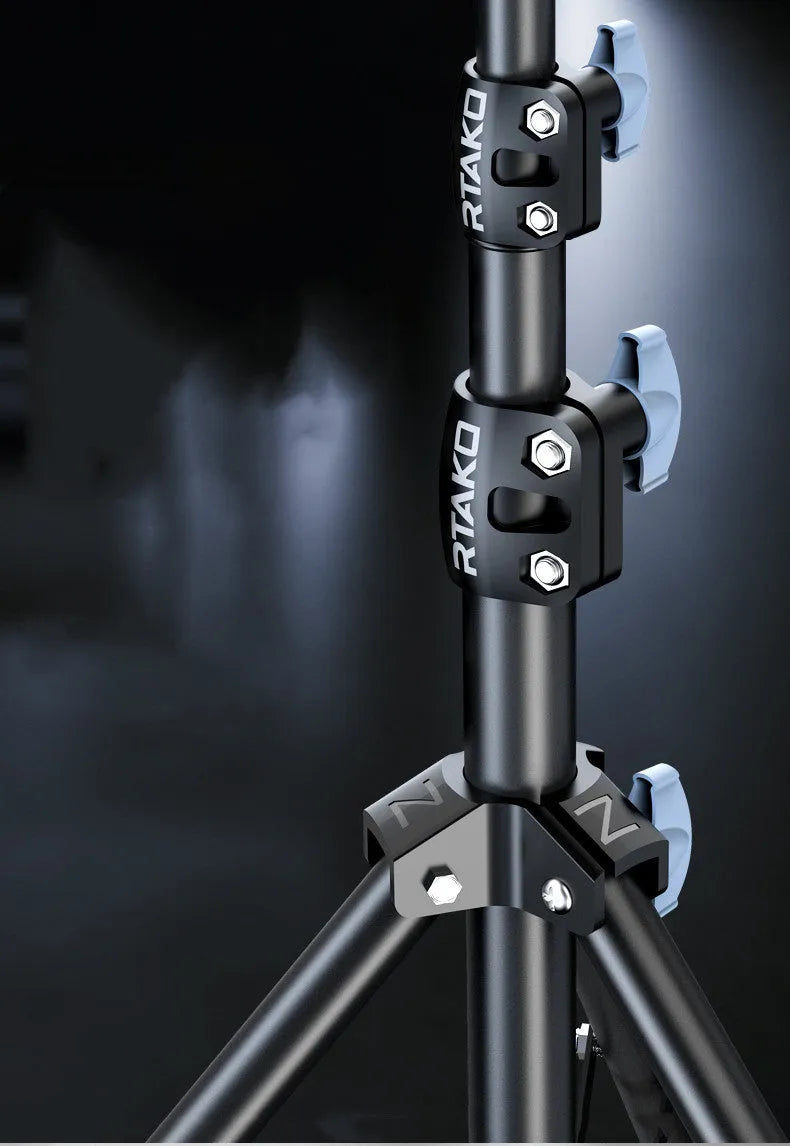 Carbon steel mobile phone tripod with ring light extended to standing height