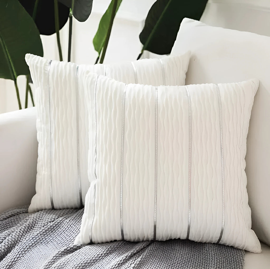 Striped velvet pillow cover in wine red colour on grey sofa