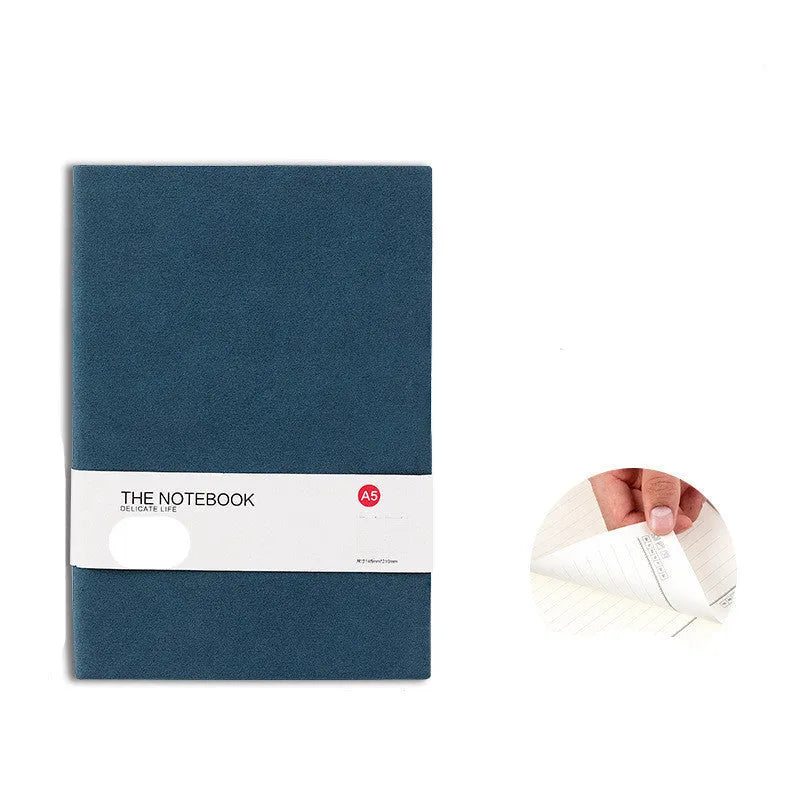 Simple solid colour thickened notebook in A5, A6 and B5 sizes on a surface.