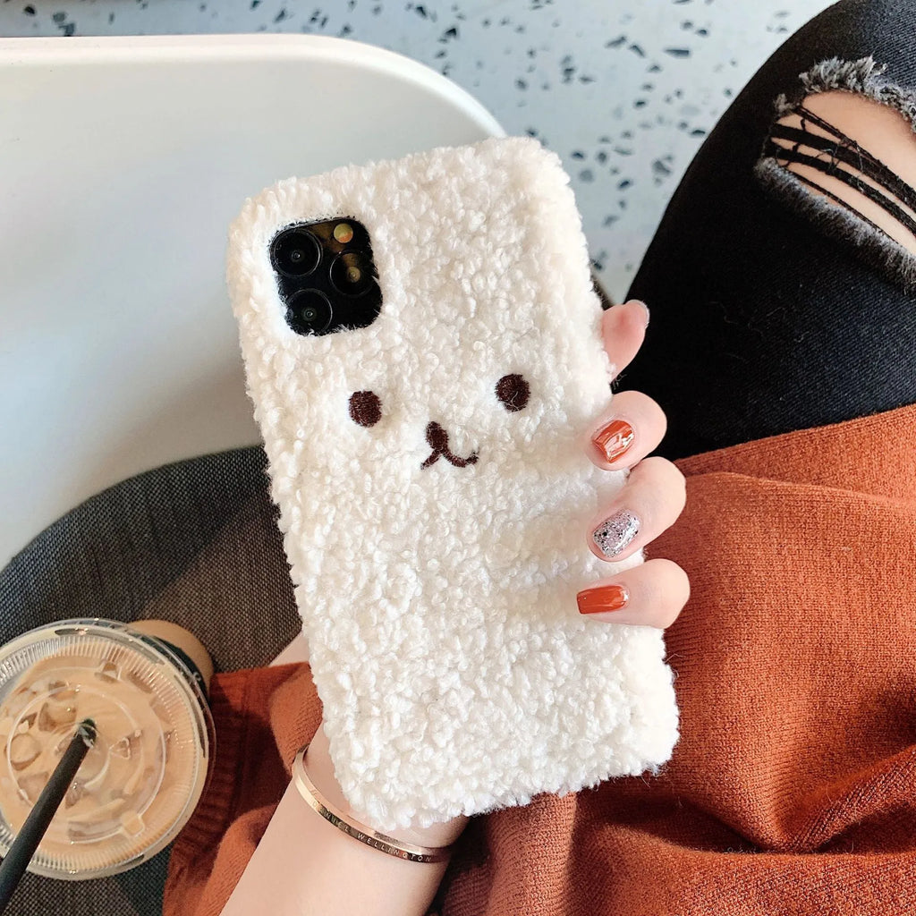 Brown and white embroidery plush cartoon bear design on a soft TPU iPhone phone case.
