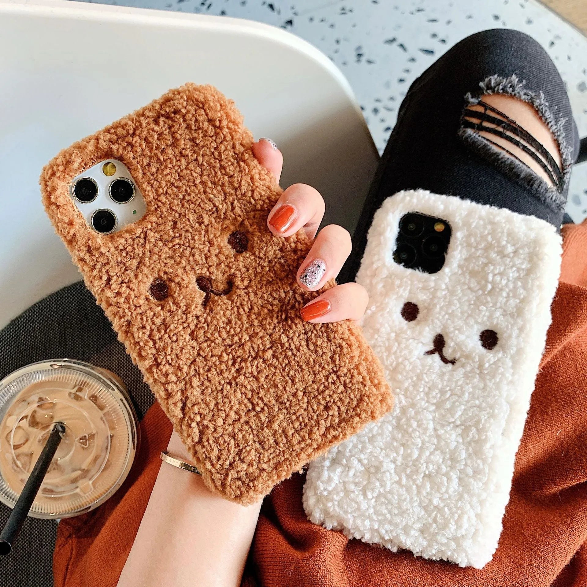 Brown and white embroidery plush cartoon bear design on a soft TPU iPhone phone case.