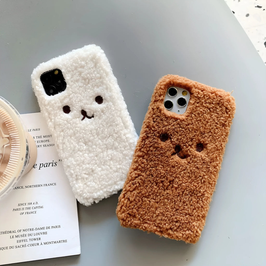 Brown and white embroidery plush cartoon bear design on a soft TPU iPhone phone case.