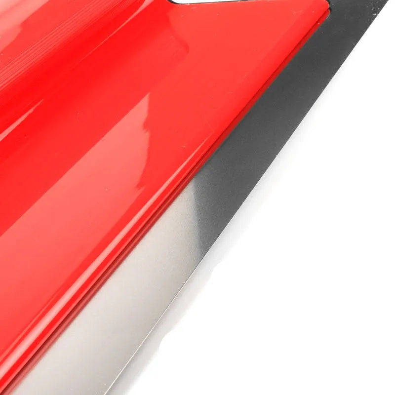 Red leveling scraper with a 40cm stainless steel blade for putty and wallpaper work