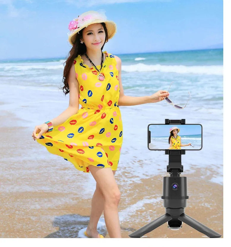 360-degree AI face tracking pan tilt bracket holding a smartphone for hands-free filming.