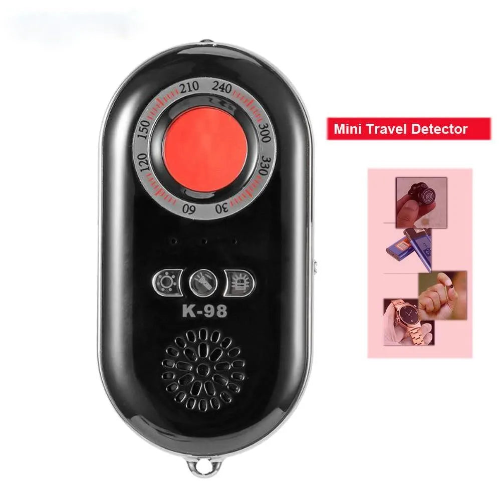 Compact black wireless signal detector with vibration alarm for anti-theft travel security.