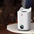 Coral Pink and Glacier White double spray humidifier with three mist outlets and USB cable.