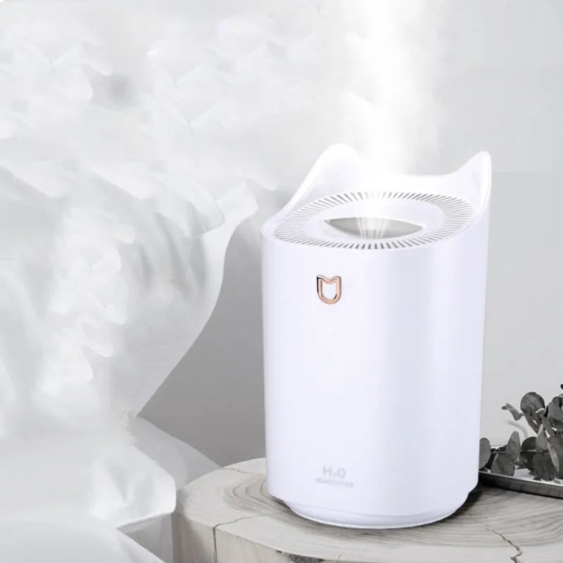 Coral Pink and Glacier White double spray humidifier with three mist outlets and USB cable.