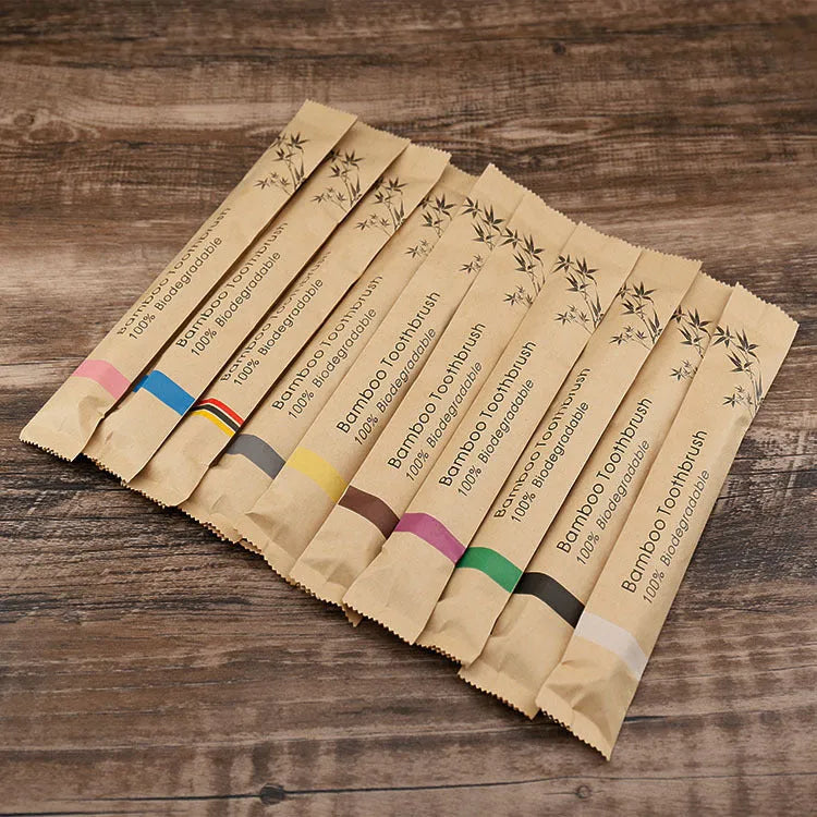 Set of natural bamboo toothbrushes with charcoal bristles in multiple colours
