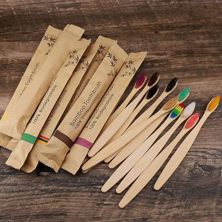 Set of natural bamboo toothbrushes with charcoal bristles in multiple colours