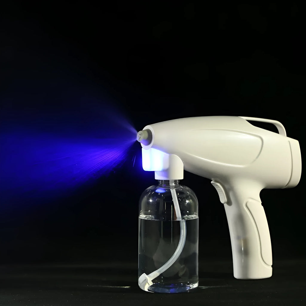 White handheld cordless electric spray disinfection gun with USB-C charging port