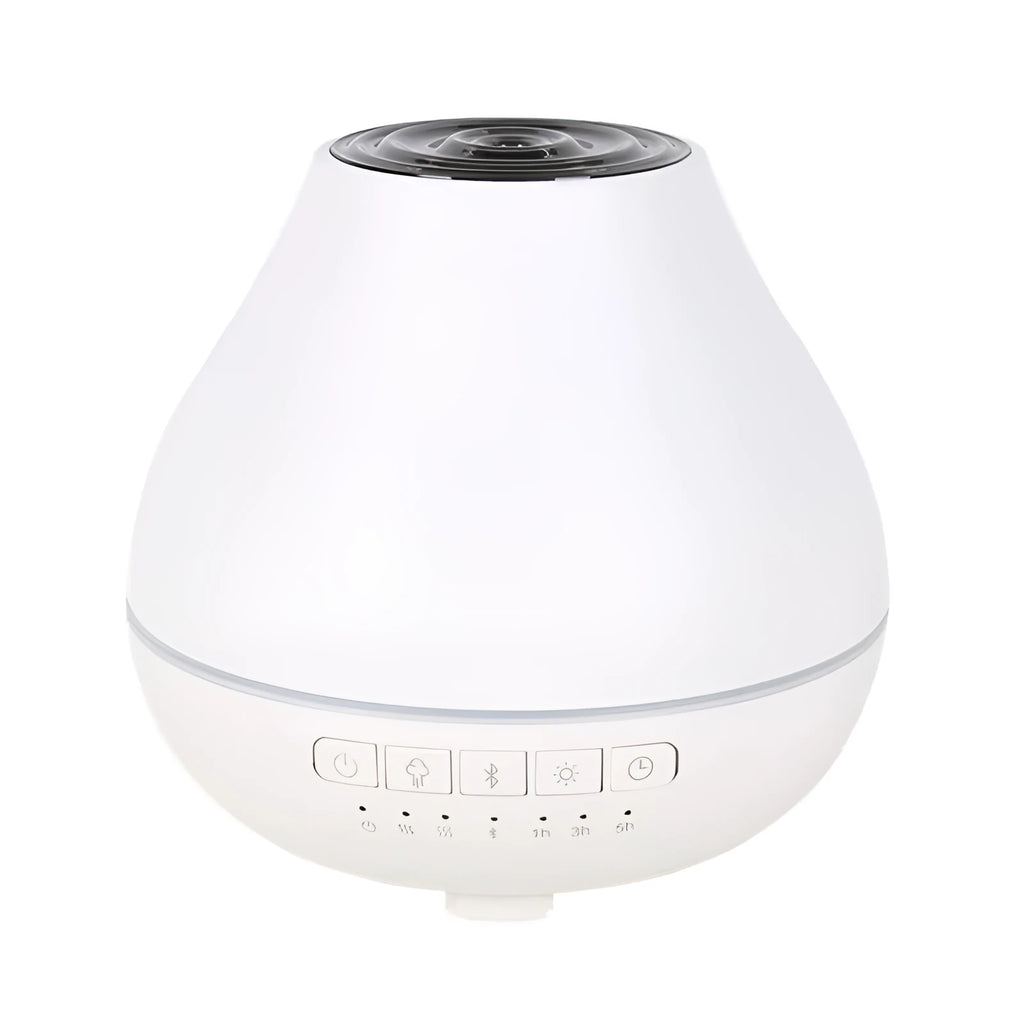 White round Bluetooth humidifier and aroma diffuser with night light on wooden surface
