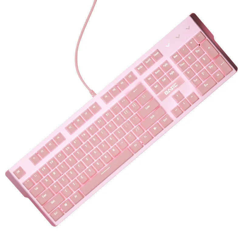 Pink wired mechanical keyboard and matching mouse with green switches on a desk.