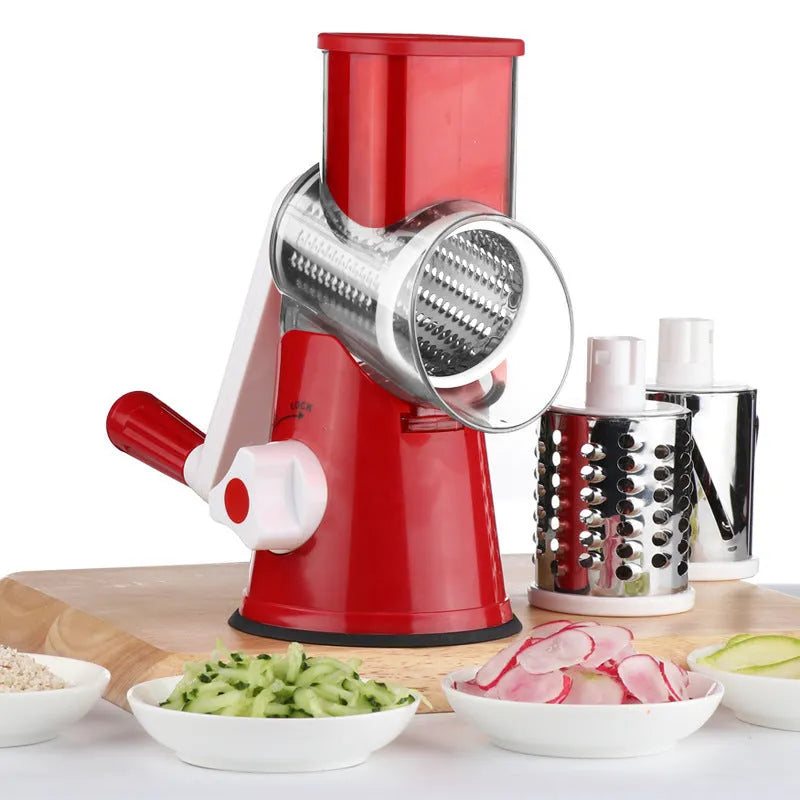 Manual vegetable chopper with suction base in blue slicing potatoes and carrots