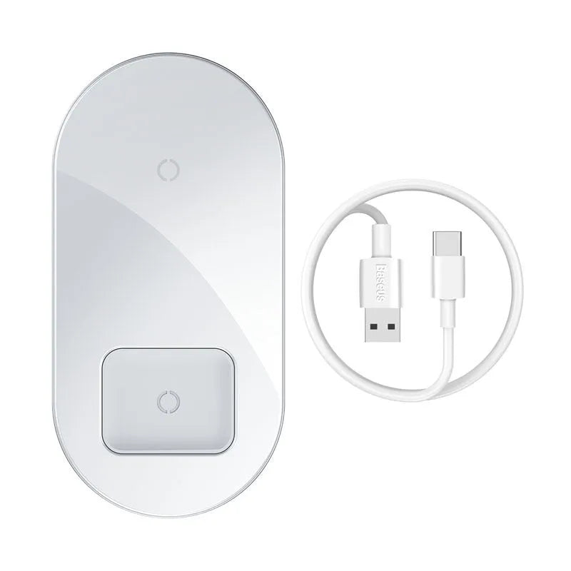 Baseus black wireless charger charging iPhone and AirPods simultaneously on wooden desk