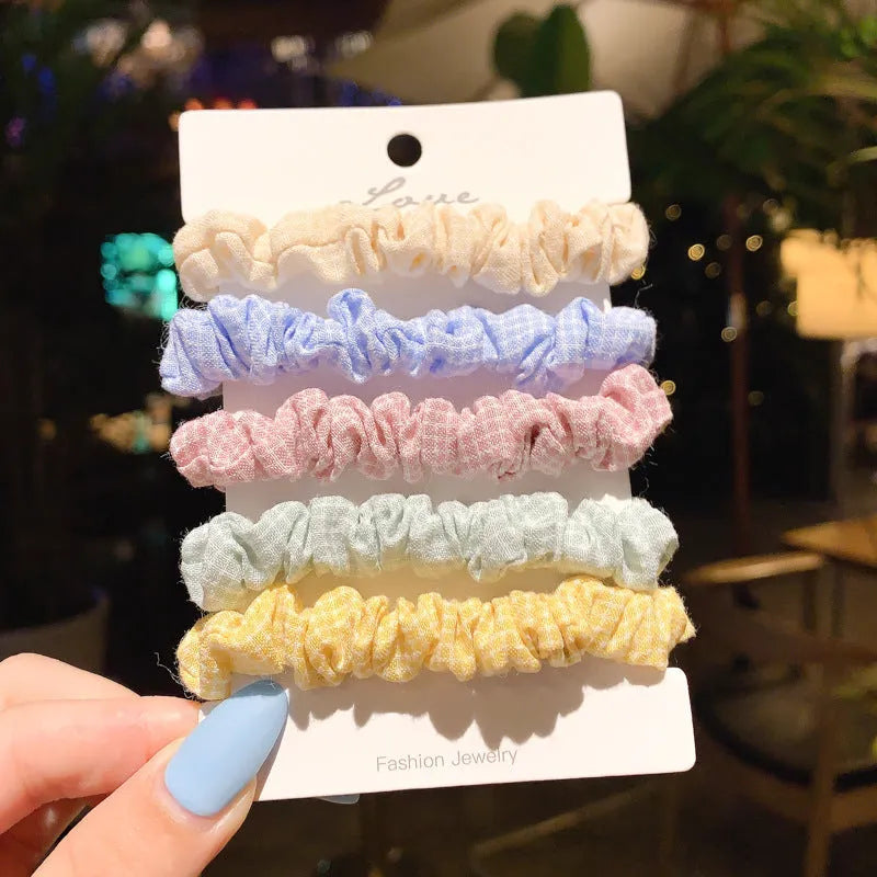 Children's 20-piece hair accessory set with hairpins, rings, and head ropes in Autumn colours