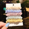 Children's 20-piece hair accessory set with hairpins, rings, and head ropes in Autumn colours