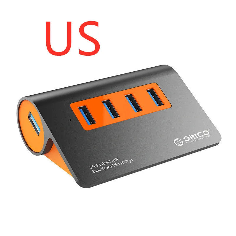 Dark grey and orange aluminium USB 3.1 hub with four ports and detachable cable