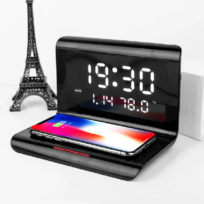 White wireless charging alarm clock with digital display showing time, date, temperature and humidity readings