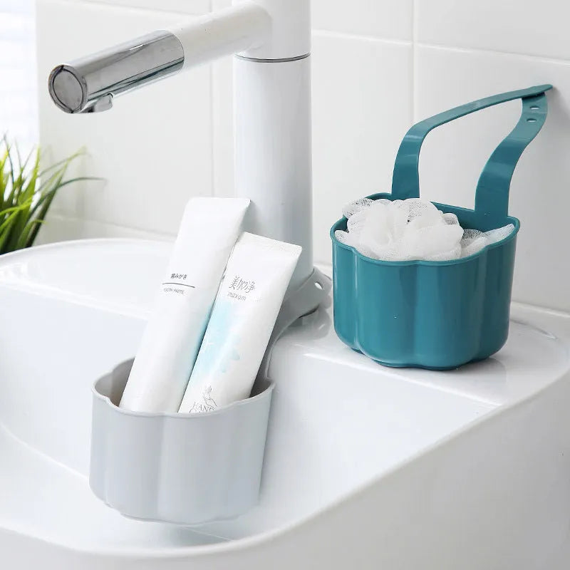 Nordic-style plastic sink drain basket in dark blue colour with water drainage slots