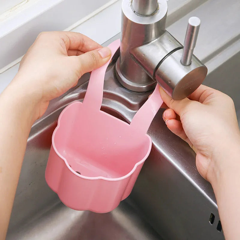 Nordic-style plastic sink drain basket in dark blue colour with water drainage slots
