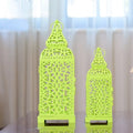 Geometric hollow iron candlestick in blue, white, or yellow, shown as a pair.