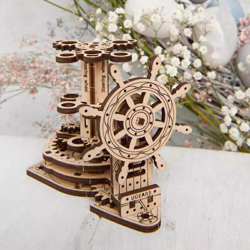 Ukrainian wooden rotating pen holder with steering wheel mechanism on natural wood desk