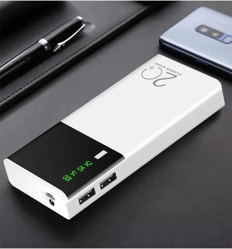 Black 20000mAh portable power bank and charging cable on a white background