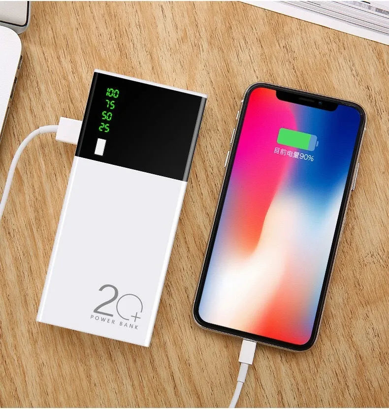 Black 20000mAh portable power bank and charging cable on a white background