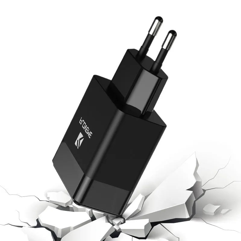 Dual-standard US and European travel charger with USB port in black or white colour