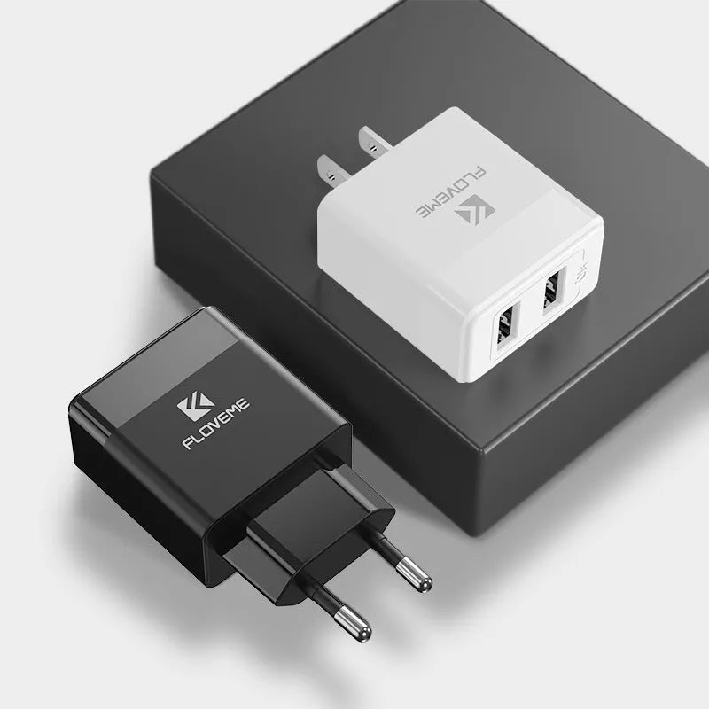 Dual-standard US and European travel charger with USB port in black or white colour