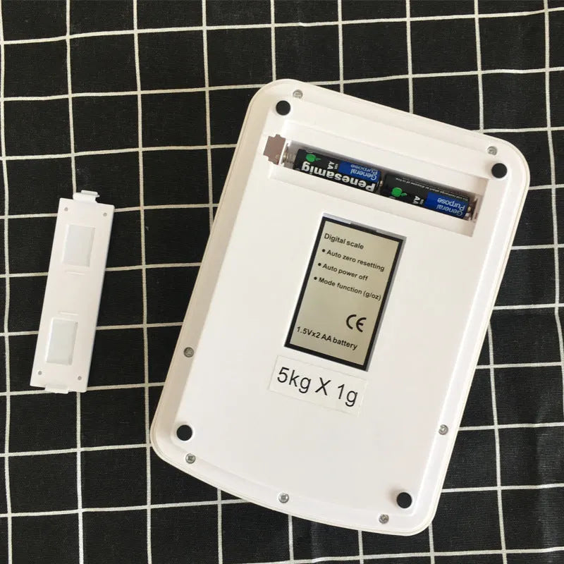 SF-400A digital kitchen scale on counter with 10kg capacity and clear display showing weight measurement
