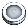 Silver wireless motion sensor night light with circular design and LED illumination