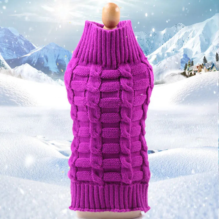 Dog wearing a wool twisted rope sweater in blue, pink, purple or red with size options from XS to XL.