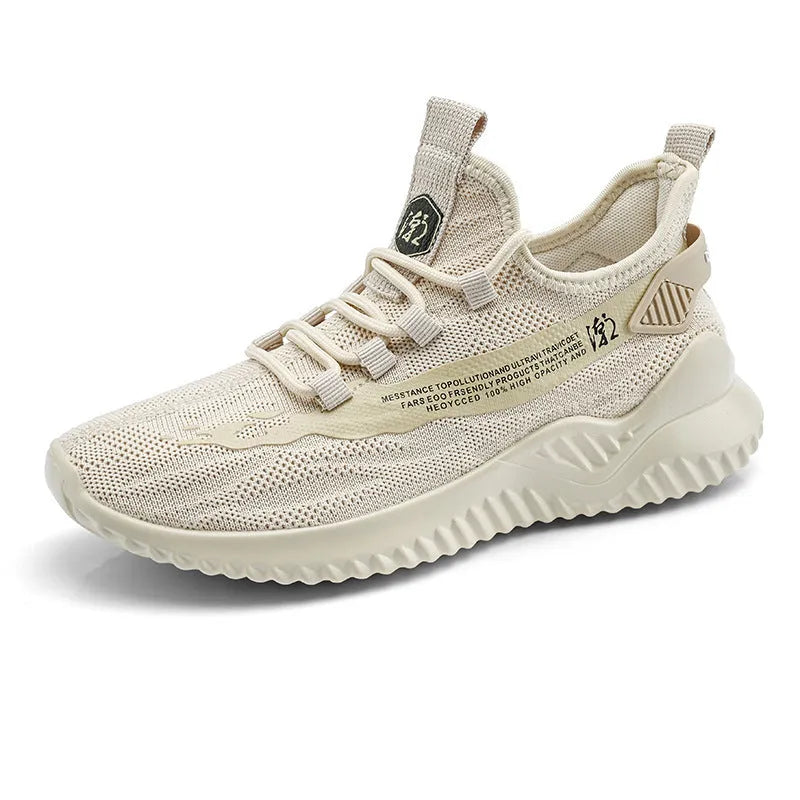 Men's white mesh sports trainers with rubber soles and lace-up closure on wooden floor