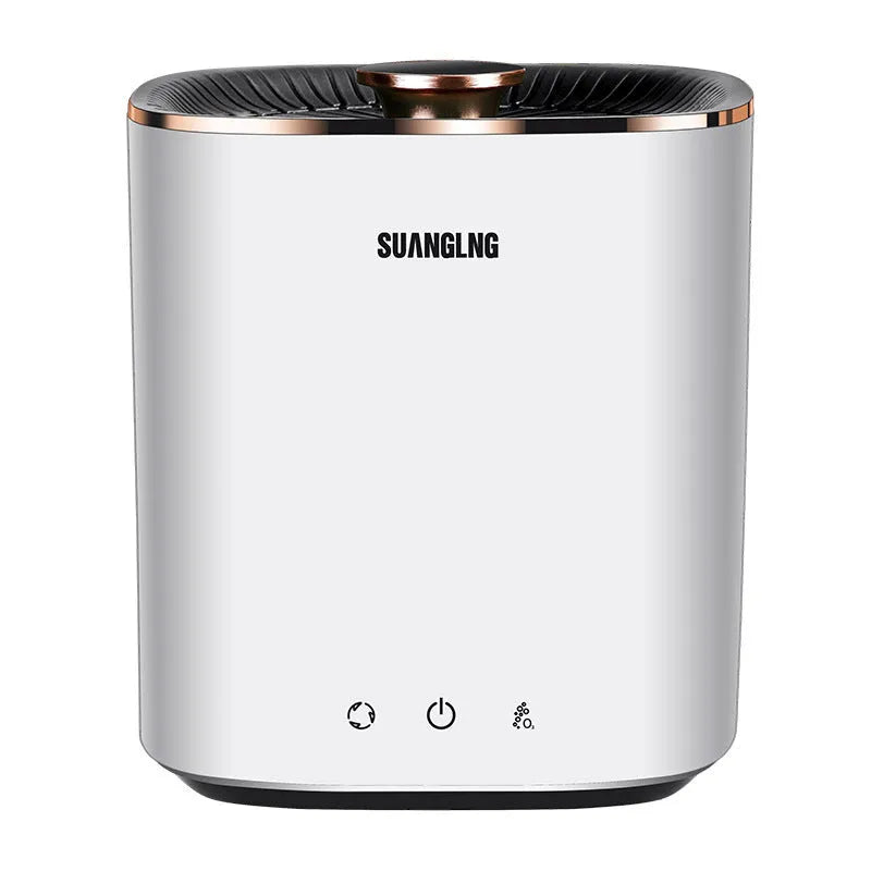 Green and white mini portable washing machine for underwear and socks on a countertop.