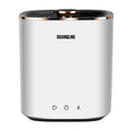 Green and white mini portable washing machine for underwear and socks on a countertop.