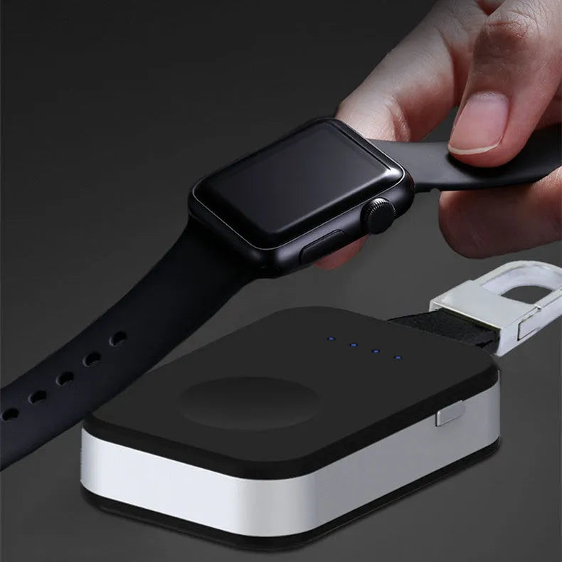 Black Apple Watch wireless power bank charger with keychain attachment showing dimensions