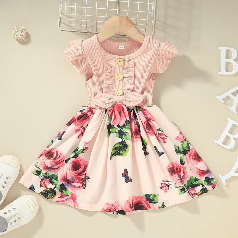 Toddler girl wearing sleeveless summer dress in one of five colour options