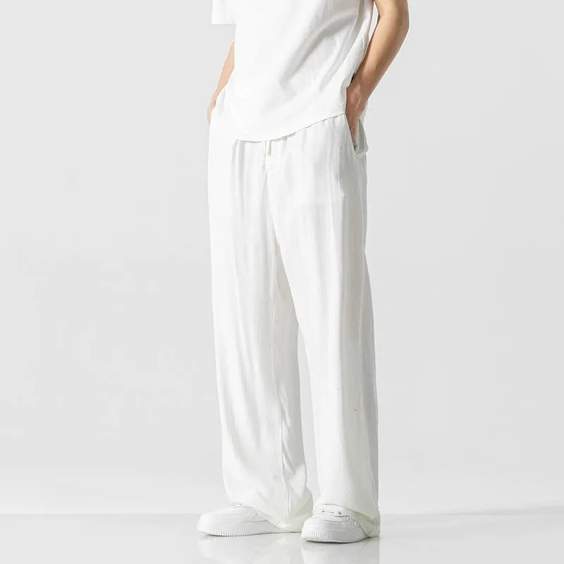 Men's bamboo fibre linen trousers in loose straight-leg cropped cut with drawstring waist