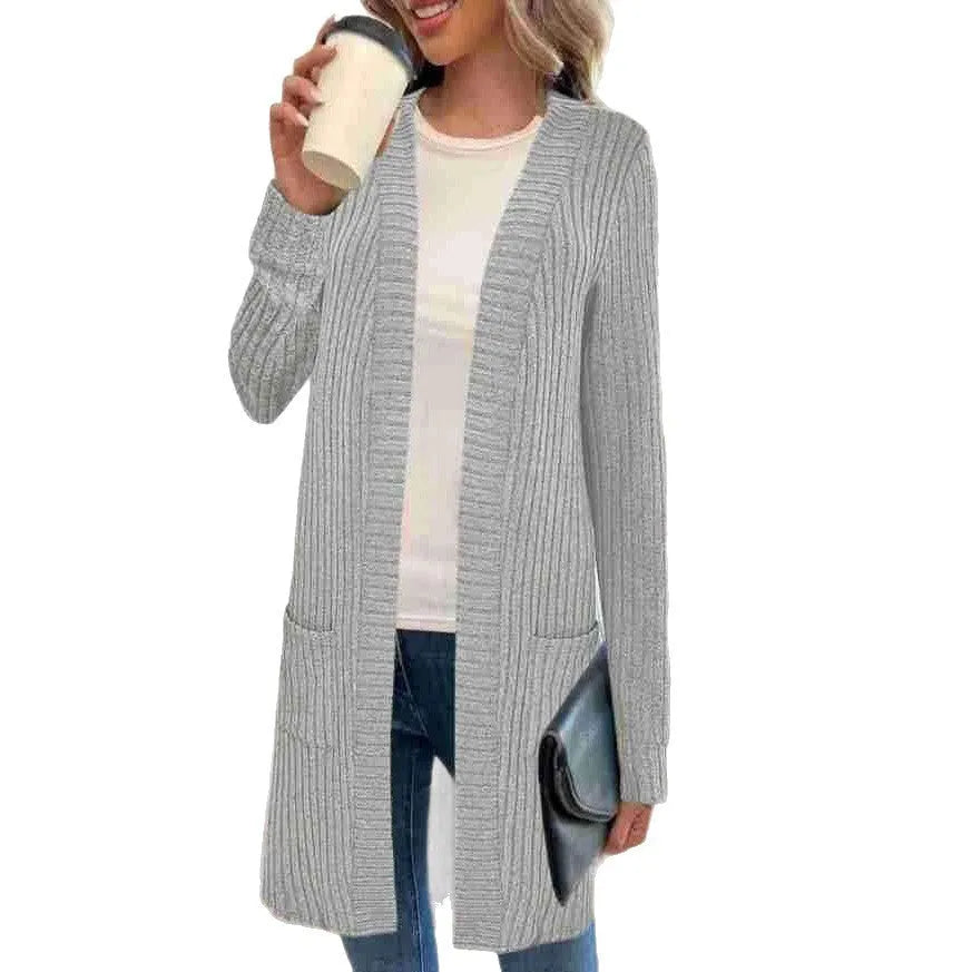 A loose-fit long sleeve knitted cardigan jacket in grey with front pockets.