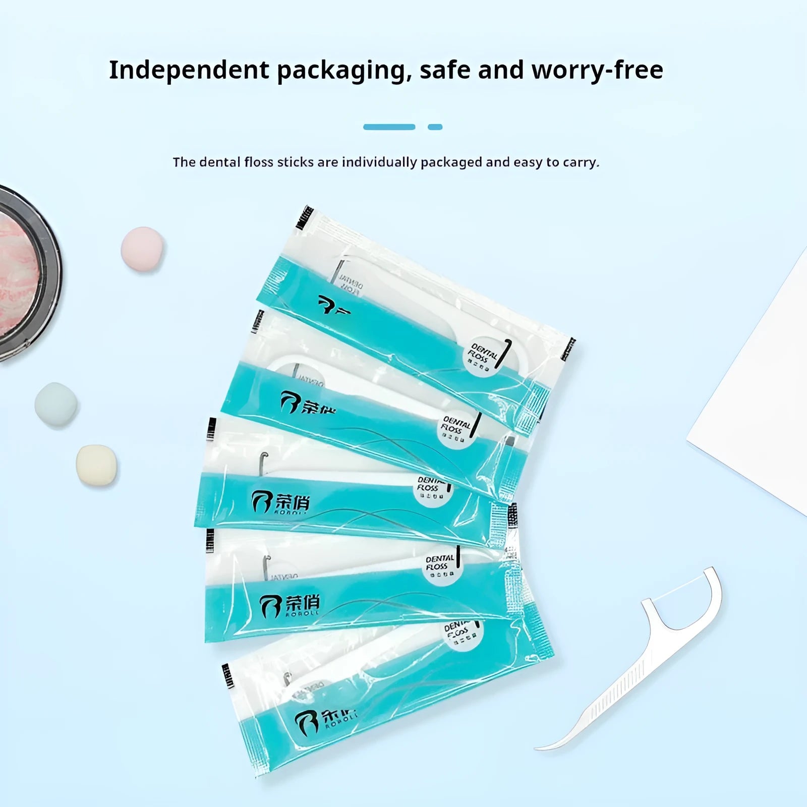 Portable bag containing disposable dental floss packs with plastic high tensile material